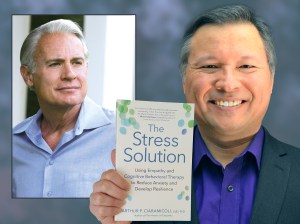 Tom Marcoux holds Dr. Arthur Ciaramicoli 's new book "The Stress Solution"