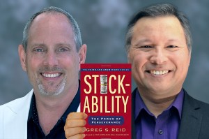 Tom Marcoux holds Greg S. Reid 's book "Stickability"